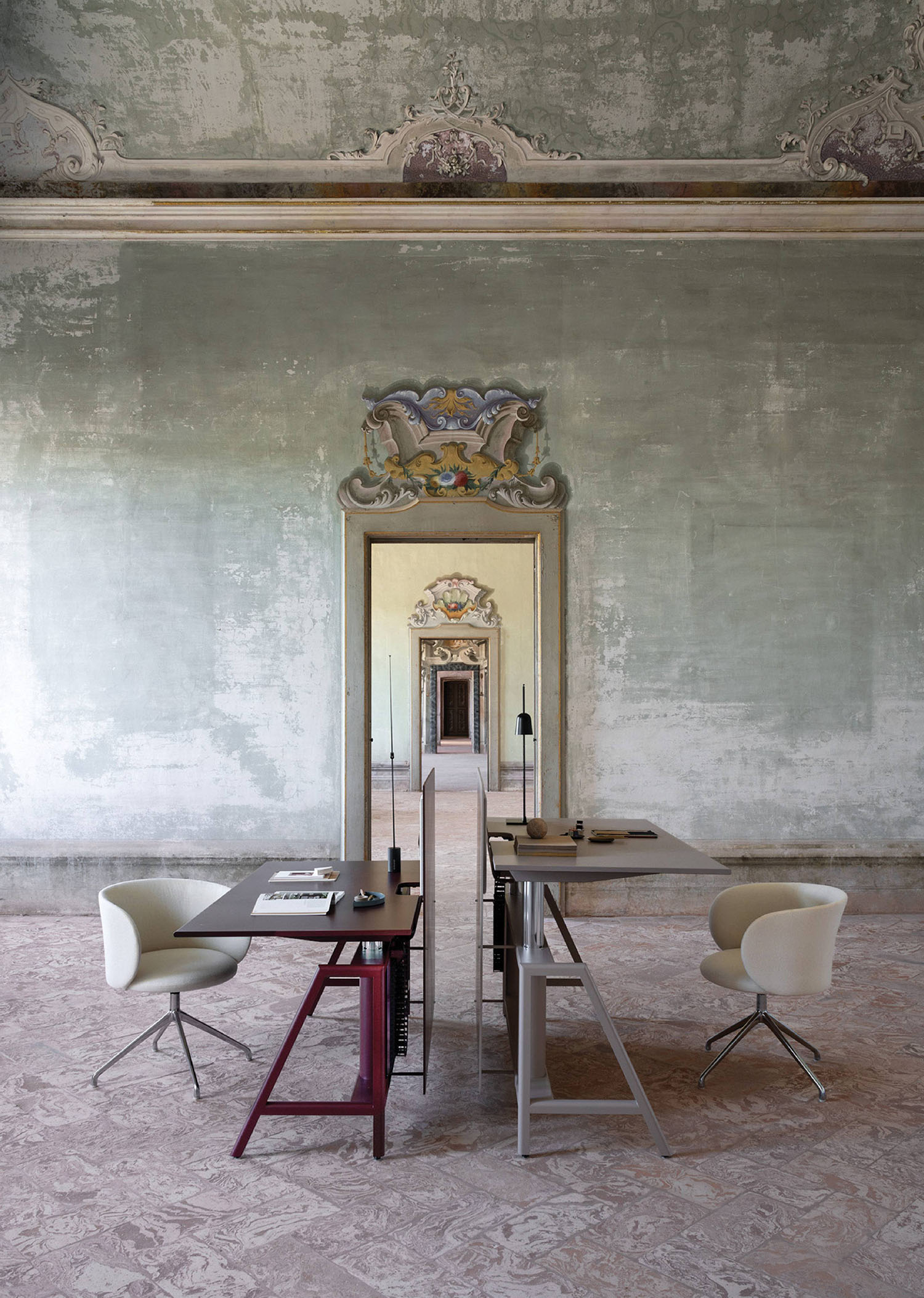 A room with a table and chairs in it.