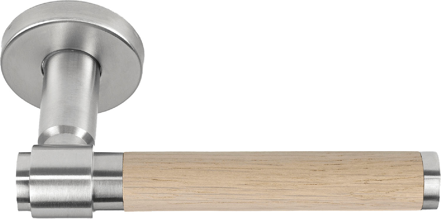 A close up of a wooden handle on a door.