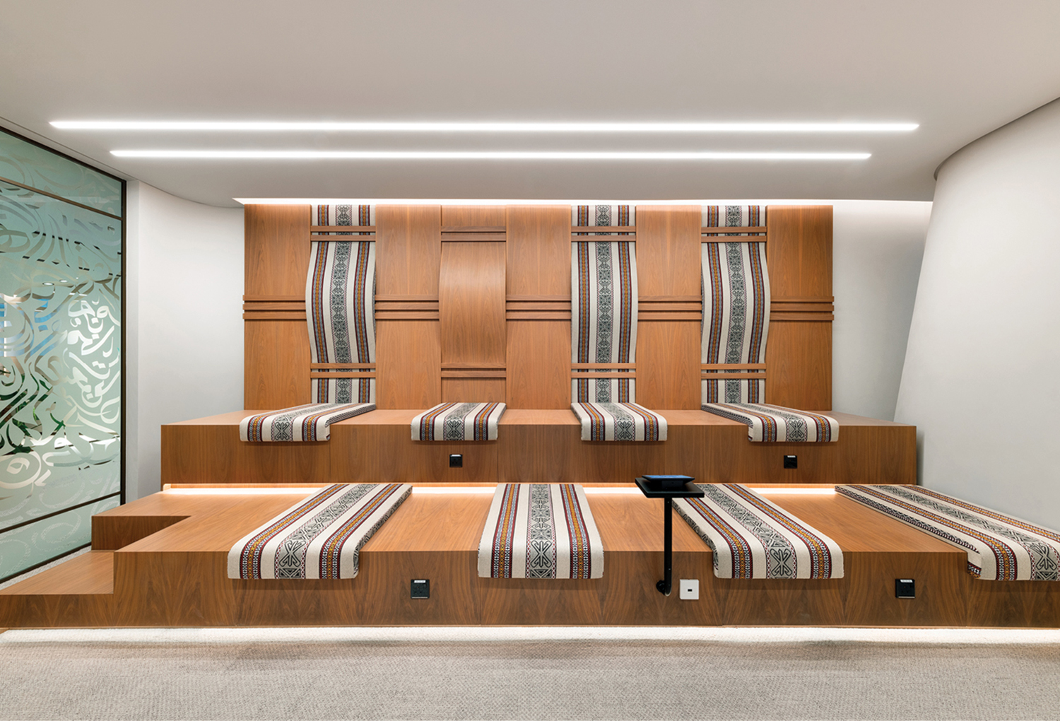 A room with a bed and a desk.