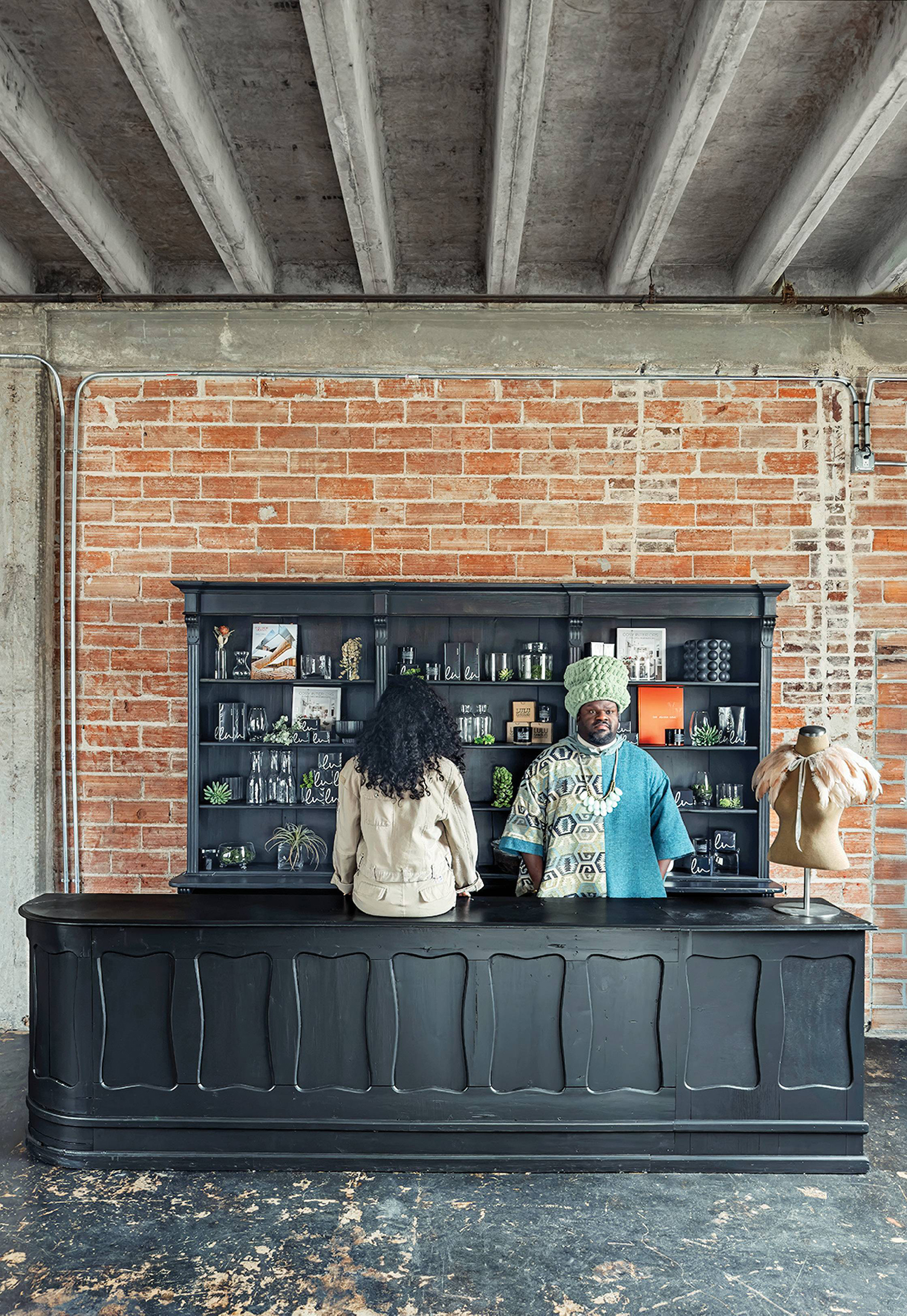 A couple of people sitting at a bar