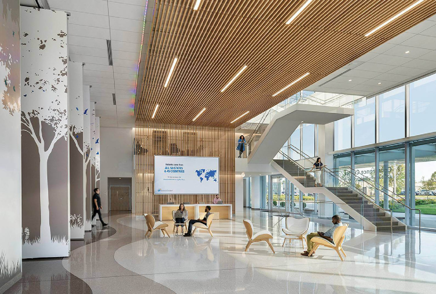 A large lobby with a large screen and a large screen