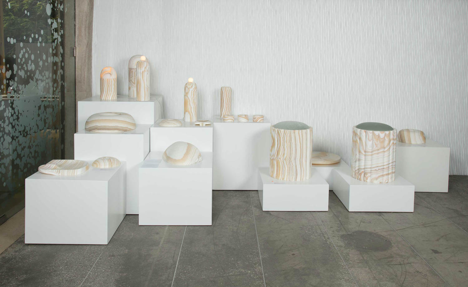 multiple pieces on white stands