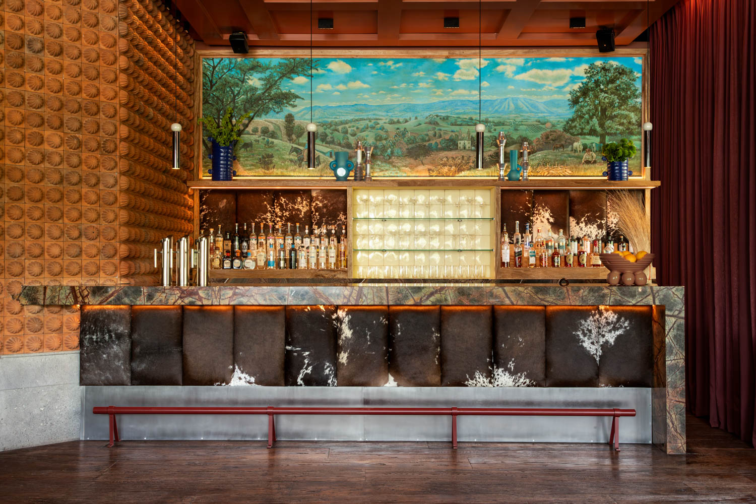 colorful murals with agave fields and ranch motifs at Bekeb Bar