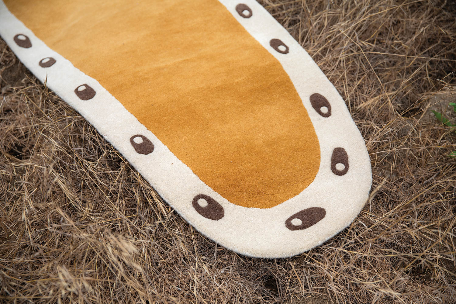 ovular yellow rug