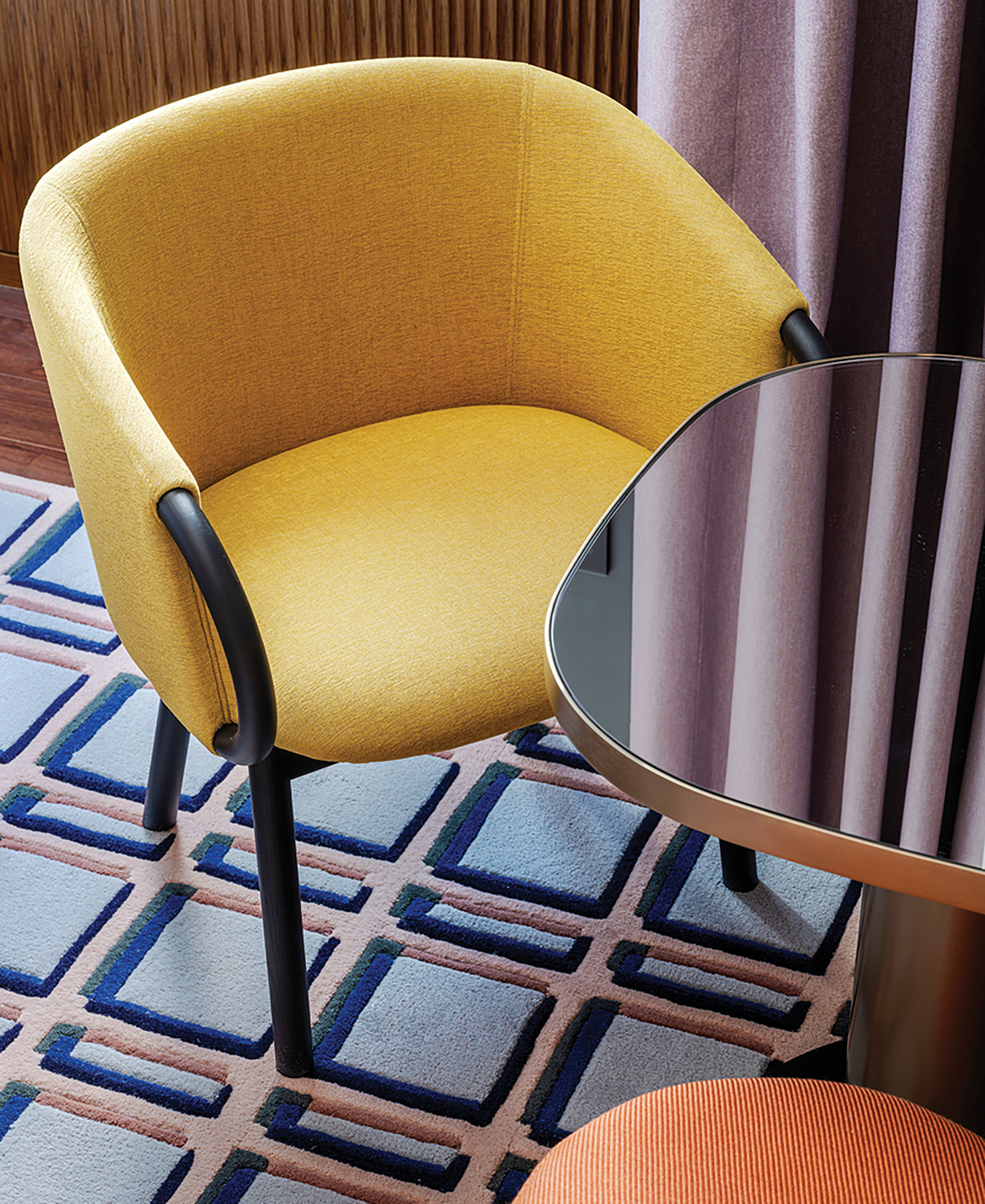 A chair with a mirror on it.