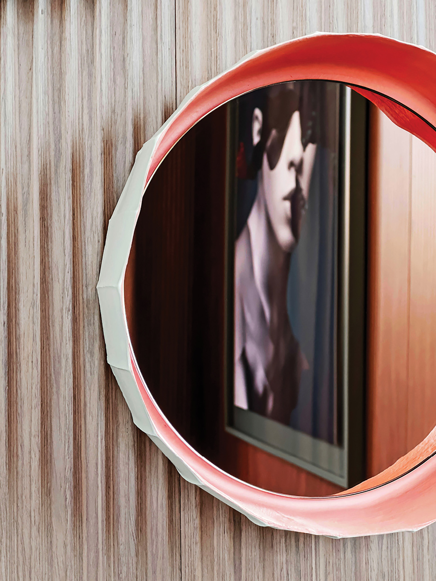 A mirror on a wall.
