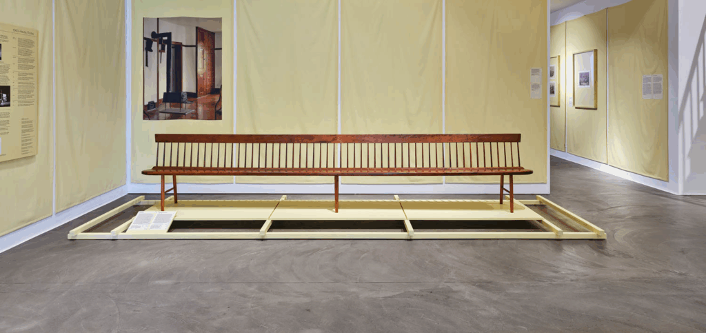 yellow room with a bench